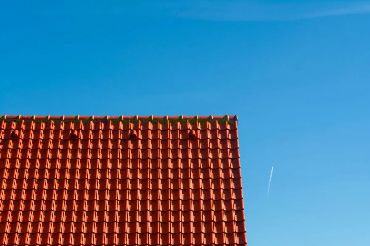 Tile roof gable in full sun, the kind of exposure that sets roof life in Costa Mesa, CA